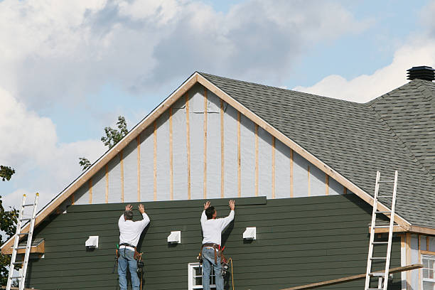 Professional Siding Installation technician working in Chester, PA